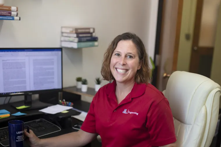 Erin Ratcliff at her desk at UArizona